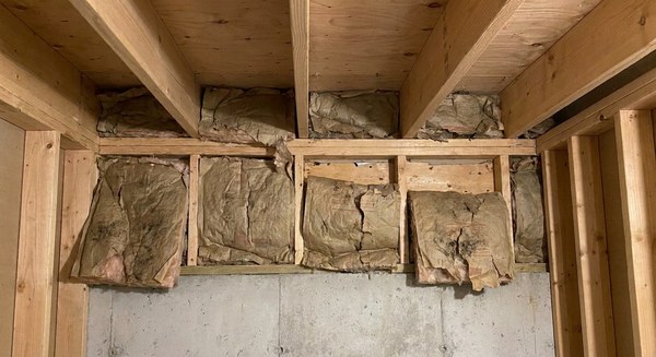 rim joist spray foam example before